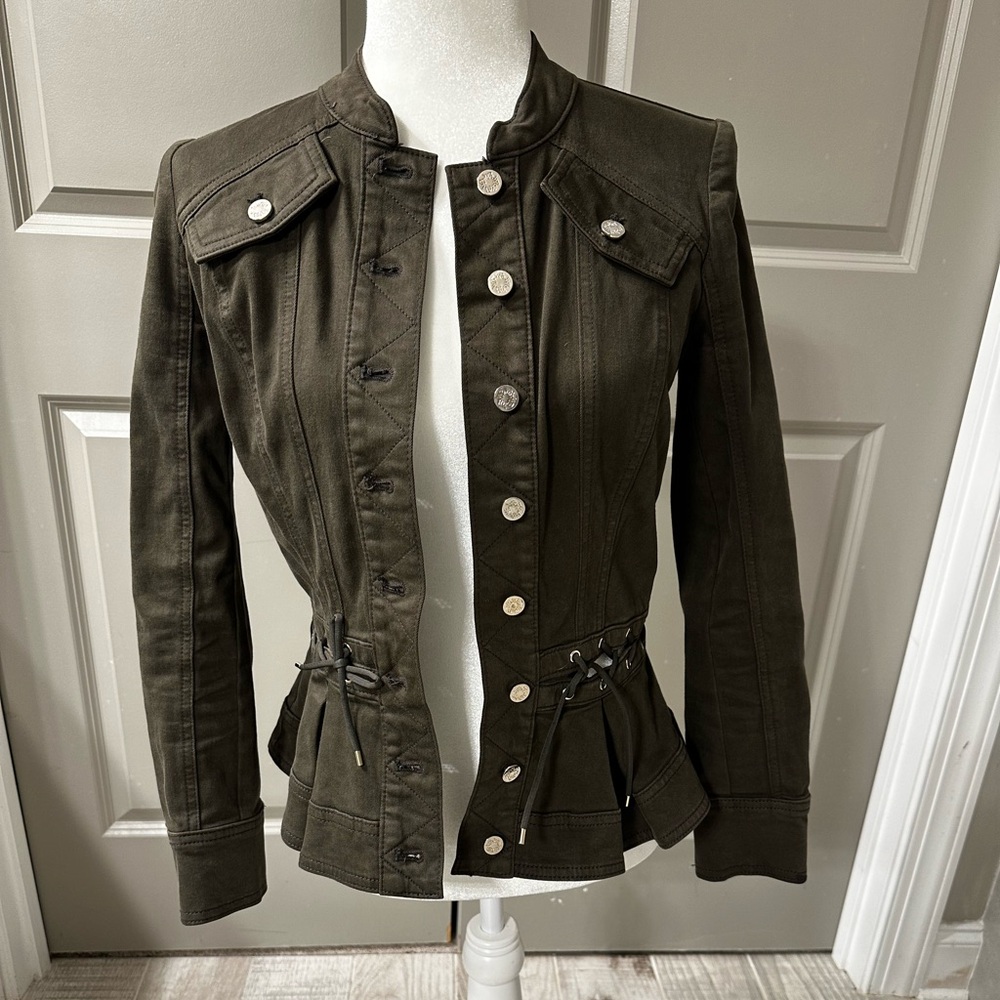 Lightly worn olive green White House Black Market jacket laced up on the side